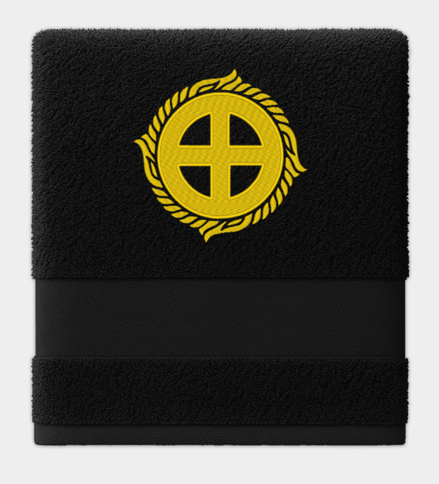 Toalla bordada con la Cruz Solar